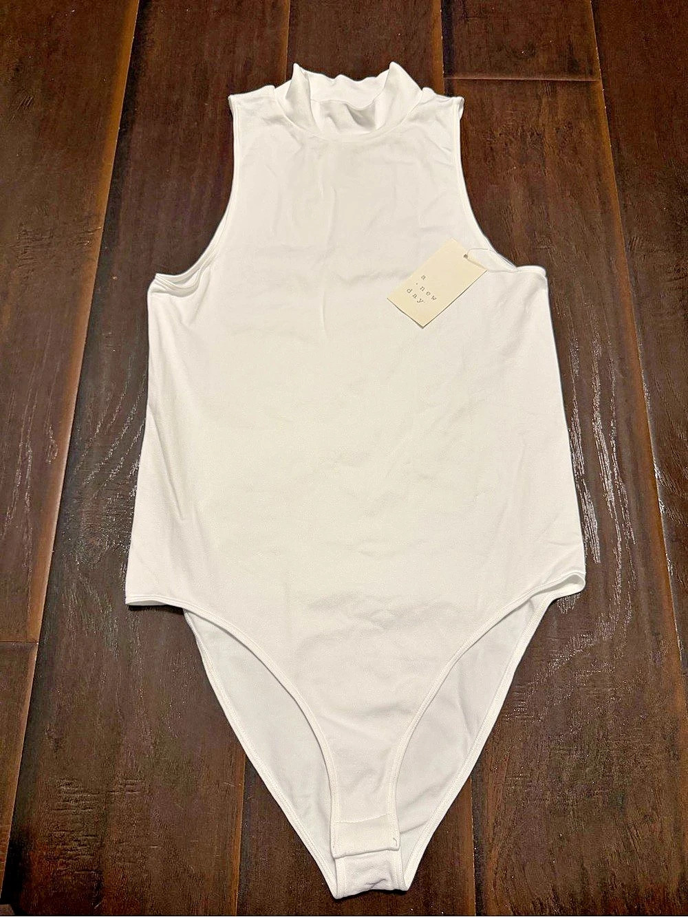 new day White Bodysuit Size Medium NWT